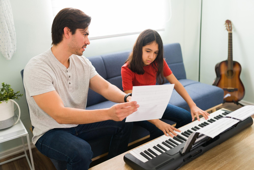 Child learning piano with parental guidance